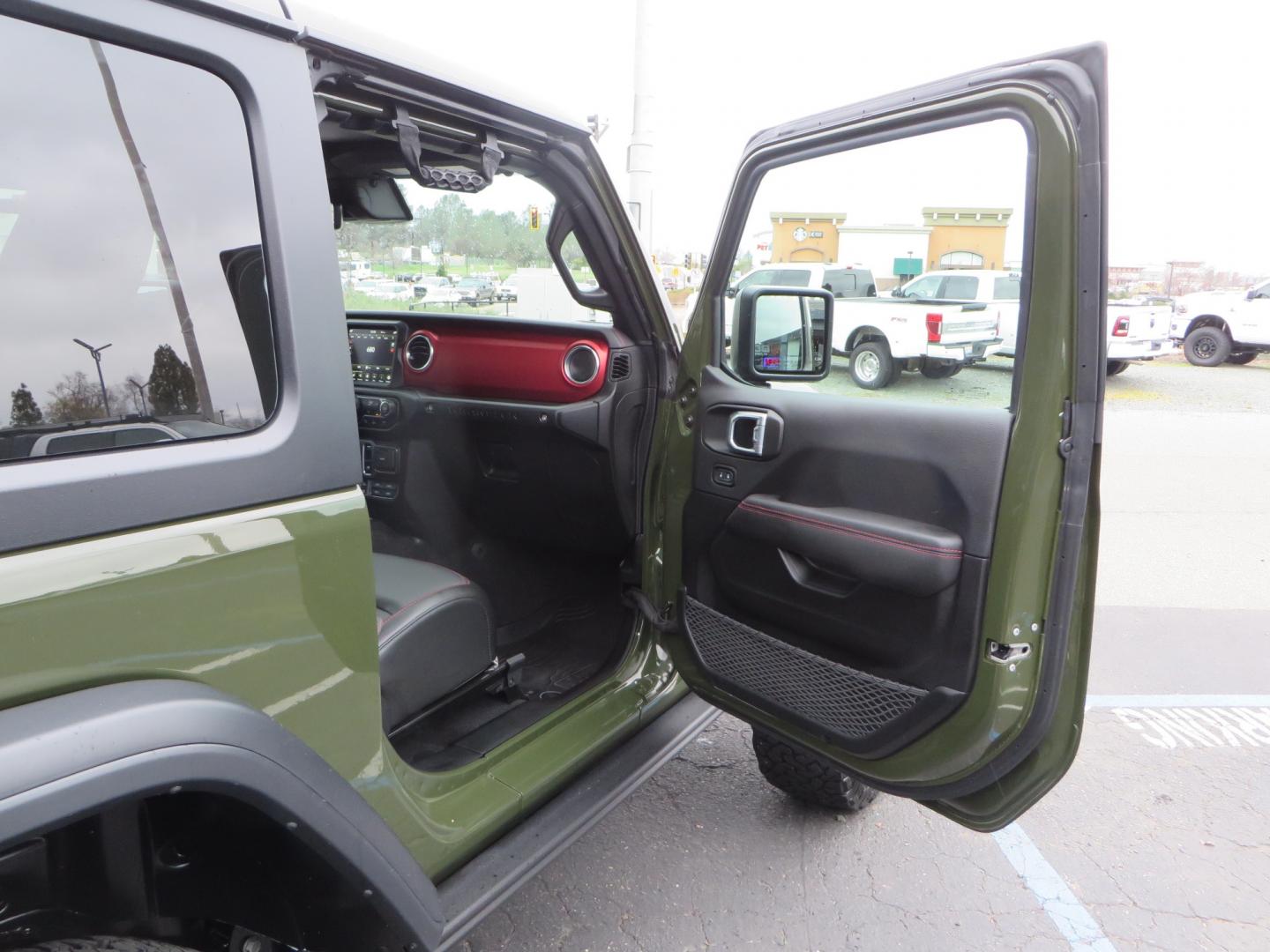 2021 Sarge Green /BLACK Jeep Wrangler Rubicon (1C4HJXCN4MW) with an 2.0L L4 DOHC 16V TURBO engine, 6A transmission, located at 2630 Grass Valley Highway, Auburn, CA, 95603, (530) 508-5100, 38.937893, -121.095482 - Rubicon featuring a Mopar suspension system, Fox shocks, 17" Fuel Wheels, BFG KO2 tires, Maxximus 3 front bumper stinger, Dual exhaust, Bolt hitch lock, Mopar HD tailgate hinge, and a custom cargo platform. - Photo#33